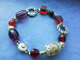 bratara cu accesorii metalice